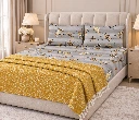 Elegant Floral Bedding with Mustard Throw.webp
