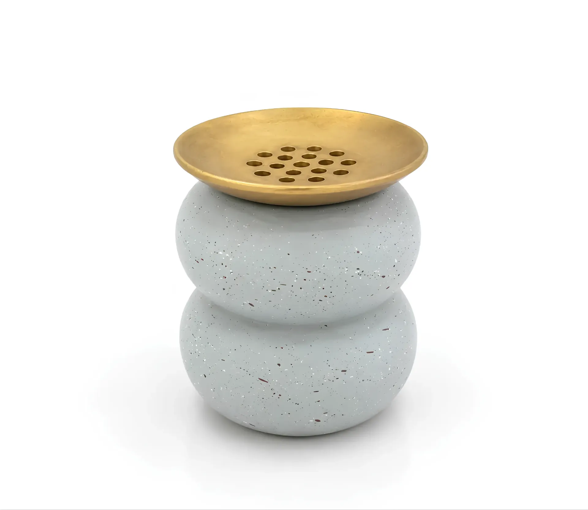 round light-colored stone incense burner with a gold-toned top dish